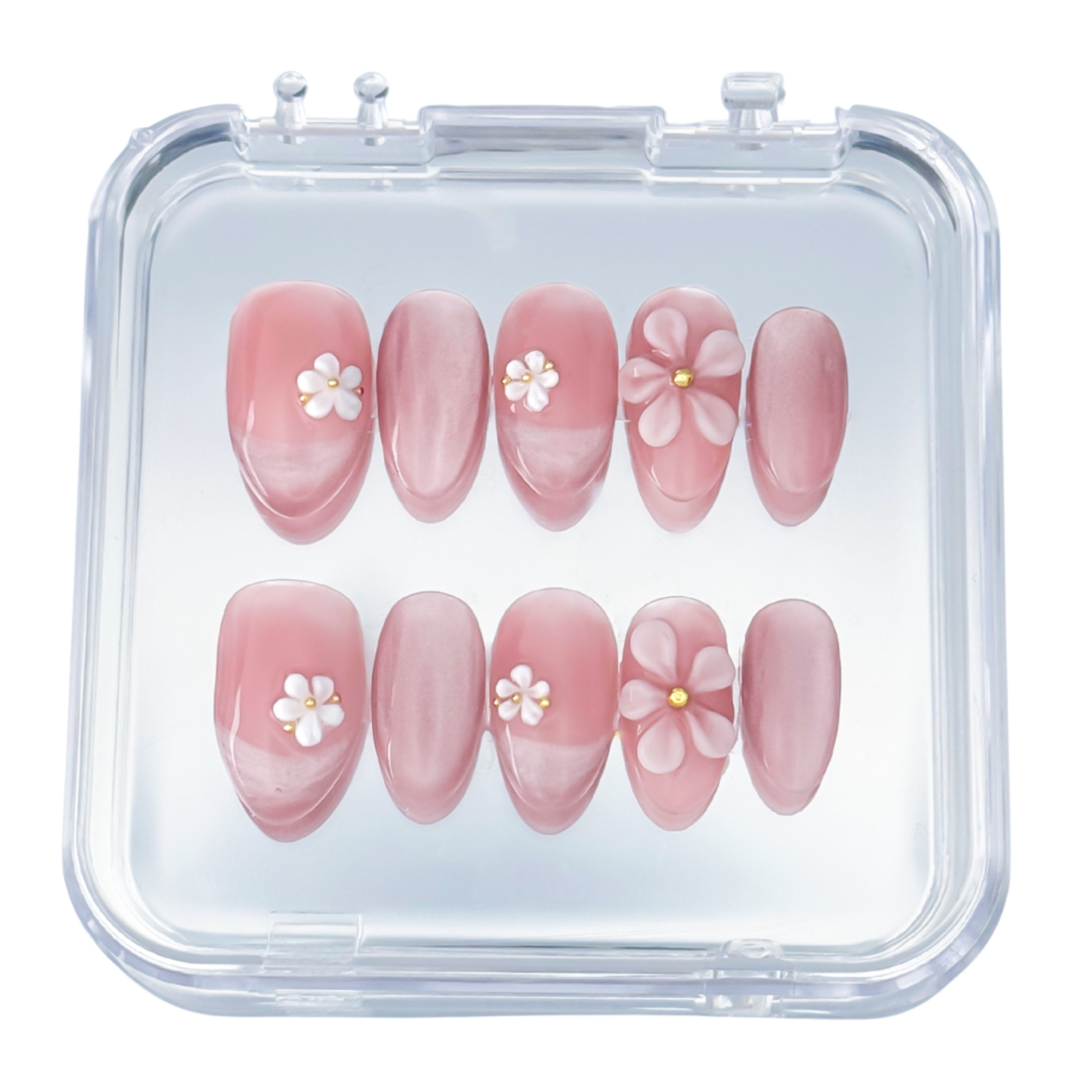 Lunoxcore Daisy Daze press-on nails — soft pink ombré design with 3D white flower charms and gold centers from the Whispered Shine Glowbox collection.