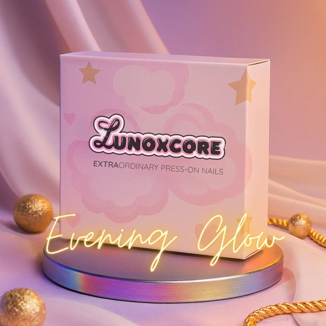 Lunoxcore Evening Glow Glowbox — pink press-on nails box with soft golden lighting and elegant decor, representing the romantic and radiant Evening Glow collection.