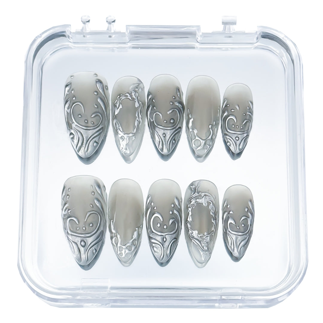 Lunoxcore Silver Circuit press-on nails — metallic silver and grey chrome design with futuristic circuit-inspired patterns from the Loudcore collection.